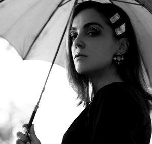 The Girl With The Green Umbrella