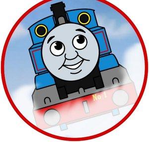 A Kid With Thomas And A Camera